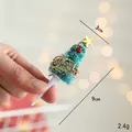 Miniature green Christmas tree cake topper with gold star and Merry Christmas sign - 3D Christmas Tree Style