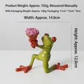 Green resin yoga frog figurine holding pink roses for home and office shelf decor - Frog Offering Flowers