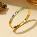 Golden titanium steel bangle featuring colorful enamel geometric patterns in green and blue - 6mm Enamel / Modern Collage (A713)