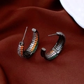 Macro view of C-shaped gunmetal earrings featuring orange, white, and green pave-set zircons - C-Shaped Zirconia Style (WE5657) / Multicolor Silver (Silver Pin)