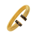 Dettaglio del bracciale a spirale dorato a forma di C con cristalli neri rettangolari - Zircone Nero