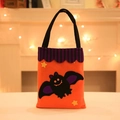 Halloween bat treat bag in bright orange felt with purple bat applique and stars - Bat Style
