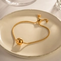 Bracelet à chaîne box ajustable plaqué or 18k avec une perle réfléchissante polie - Bracelet chaine perles boule / Or
