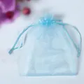 Light blue organza drawstring bag with silk ribbon closure for jewelry and gift packaging - Light Blue; 5x7cm