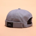 Grey cotton docker hat for men and women with a black woven label for street style - Peeping Label Grey