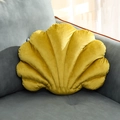 Shell-shaped velvet throw pillow in vibrant yellow on a modern grey living room sofa - 28x38x10cm / Dark Yellow