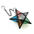 Macro view of Moroccan star lantern with multicolor patterned glass and metal chain - Colorful