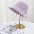 Hand-knitted light purple hollow fisherman hat with delicate lace-up bow and wavy brim - Lavender