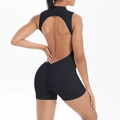 Detailed back view of black backless yoga romper with scrunch butt lifting design - S / Black