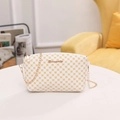 White crossbody bag with yellow geometric pattern and elegant golden chain strap - White