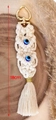 Bohemian beige macrame keychain with blue evil eye beads and golden tassel detail - White Style 2