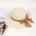 Beige wide brim straw hat with brown ribbon and pearl details for sun protection - One Size / White