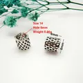Macro shot of 8mm hollow mesh barrel bead with 6mm hole for DIY jewelry making - Style 14 (Hollow Mesh)