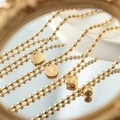 Collana minimalista a sfere in acciaio inossidabile placcato oro 18k con multi-pendente - Stile multi-ciondolo