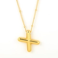 Golden puffy cross pendant necklace in polished titanium steel on white background - Gold - X
