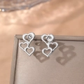 Three-heart hollow silver earrings in 14K gold style stainless steel on jewelry box - Triple Heart Hollow Style (C8988) / Silver (C8988)