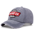 Close-up of vintage washed grey baseball cap with motor oil embroidery and worn brim details - Adjustable / Blue