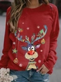 Close-up of red Christmas sweatshirt featuring reindeer and snowflake print on the street - S / Tops / Bright Red