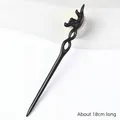 Ebony wood hair pin with intricate floral carving and 18cm length in dark black - Carved - Playing with Plum