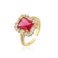 Close-up of 18K gold-plated adjustable ring featuring a large square red zircon center stone - Adjustable Open / Red