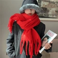 Close-up of thick red mohair scarf with fringe detail and soft fluffy texture for winter - Red