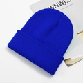 Detailed view of the vibrant blue knitted acrylic beanie hat with fine ribbing texture - One Size / Blue