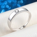 Elegant silver engagement ring with a round clear zircon stone on a textured surface - 30-point Ring Ljz-149 / Adjustable Open