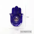 Dunkelblaue Hamsa-Hand Schmuckschale aus Keramik mit goldenem Auge, 16cm x 11,5cm - Böser Blick Wimpern (Königsblau) Platte