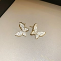 Elegant gold butterfly earrings with white enamel and sparkling zircon stones on beige leather - 12# Gold & White Butterfly