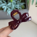 Detailed view of glossy burgundy bow hair claw clip with golden metal spring - Cherry Red - Small Bowknot