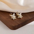 Elegant gold butterfly earrings with zircon stones on a luxury walnut wood display stand - Gold Zircon Butterfly Ear Hook