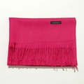 Detail shot of a rose red cashmere scarf showing soft fabric texture and fringe tassels - 70cm / Rose Red