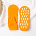 Orange low-cut trampoline socks with white footprint-shaped non-slip silicone grips - Adult Size (EU 35-42) / Orange Red