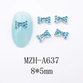 Détail macro de nœuds en cristal bleu pour manucure avec base en métal argenté 8x5mm - Style Nœud Papillon (A637)