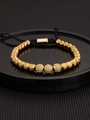 Vintage golden crown bracelet with sparkling zircon beads and adjustable black woven cord - Gold Triple Zirconia Ball Bracelet