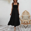 Abito lungo nero da donna con bustino a punto smock, spalline con fiocco e gonna a balze - S / Nero