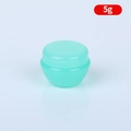 Green 5g mushroom shaped cosmetic cream jar with matching lid in plastic finish - Green