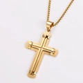 Detailed view of two-tone stainless steel cross pendant with gold finish on white background - Gold (With Chain)