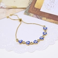 Adjustable gold heart evil eye bracelet with blue zircon and sliding clasp design - Sky Blue