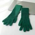Long green knitted rabbit fur gloves for women displayed on a white desk with laptop - Green