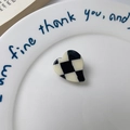 Mini heart-shaped acetate hair claw clip featuring a classic black and white checkerboard pattern - Black and White Checkered