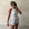 Witte tweedelige damesset met haltertop en bijpassende short van getextureerd katoenstof - S / Wit