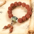 5-Petal Nepal Rudraksha Bodhi seed bracelet with agate beads and Zen-style ink wash background - 18mm With Ox Horn Tri-junction And Disciple Beads