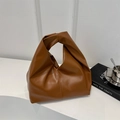 Minimalistische donkerbruine PU-leren handtas met een uniek handvat met knoopontwerp - Bruin