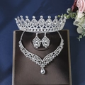 Elegant bridal jewelry set with silver crown, necklace, and earrings featuring shiny rhinestones - Silver Style (ZUHE-013)