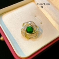 Detail view of emerald green crystal brooch with cubic zirconia showing 2.1cm size - D009 Green