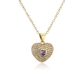 Detail of gold necklace featuring a heart pendant with micro-pave purple zircon stones - Gold Heart Purple Gemstone O-Chain
