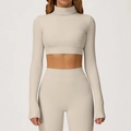 Tweedelige yogaset voor dames met crop-top met opstaande kraag en beige legging met hoge taille - S / Haver Abrikoos