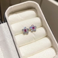 Close-up of silver floral stud earrings with red and white zircons in a white leather box - Silver Earring Post - Silver - Pink