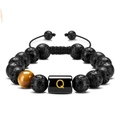Adjustable black lava stone and tiger eye beaded bracelet featuring golden letter Q charm - Letter-Q